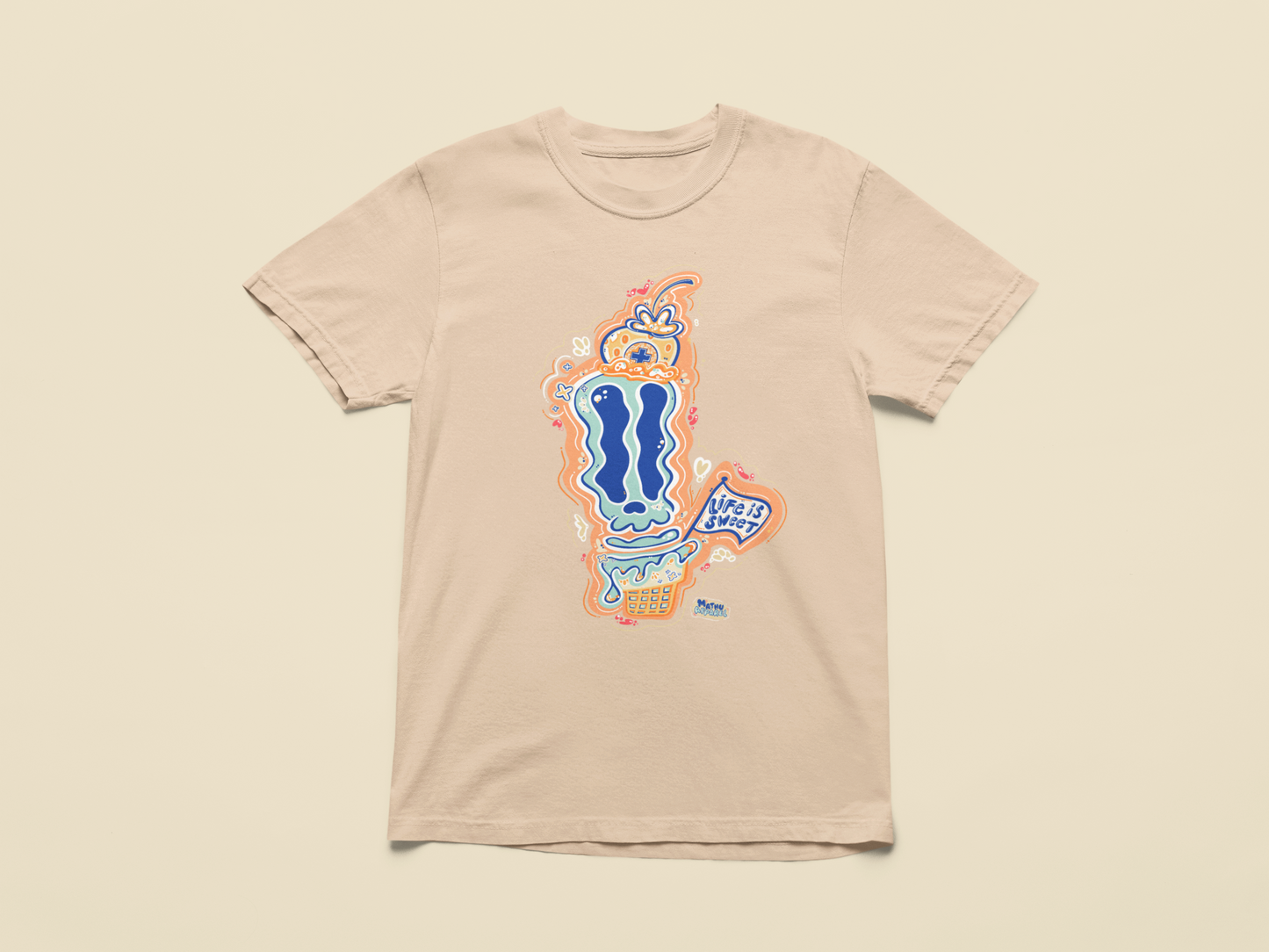 Beige t-shirt with colorful graphic design on a beige background