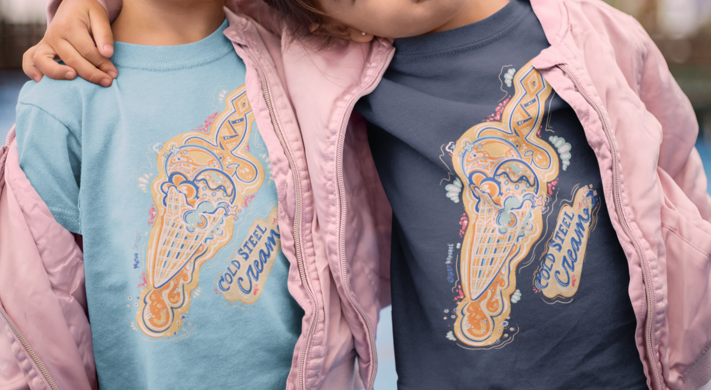 Two children wearing matching t-shirts with a colorful design, standing close together.