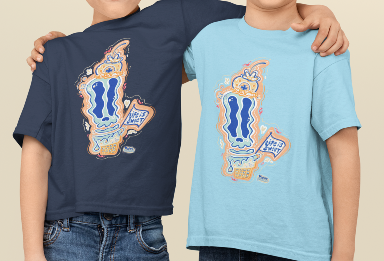 Two children wearing matching t-shirts with a graphic design on a beige background